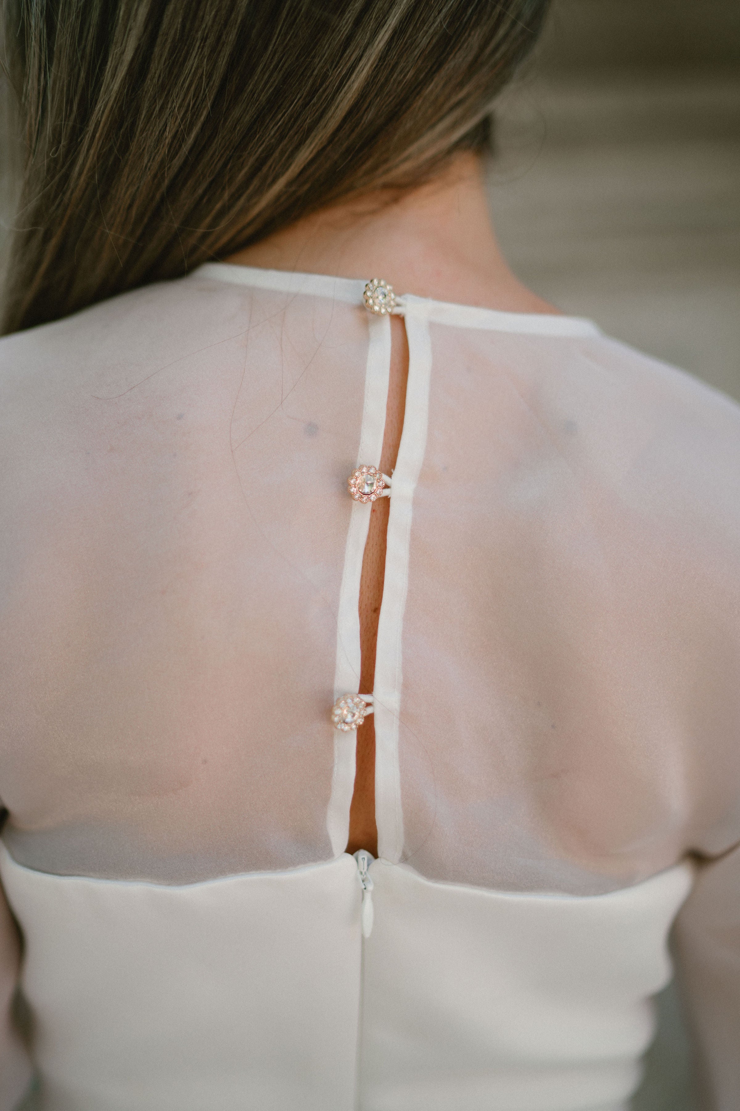 WHITE BLOUSE WITH JEWEL BUTTONS