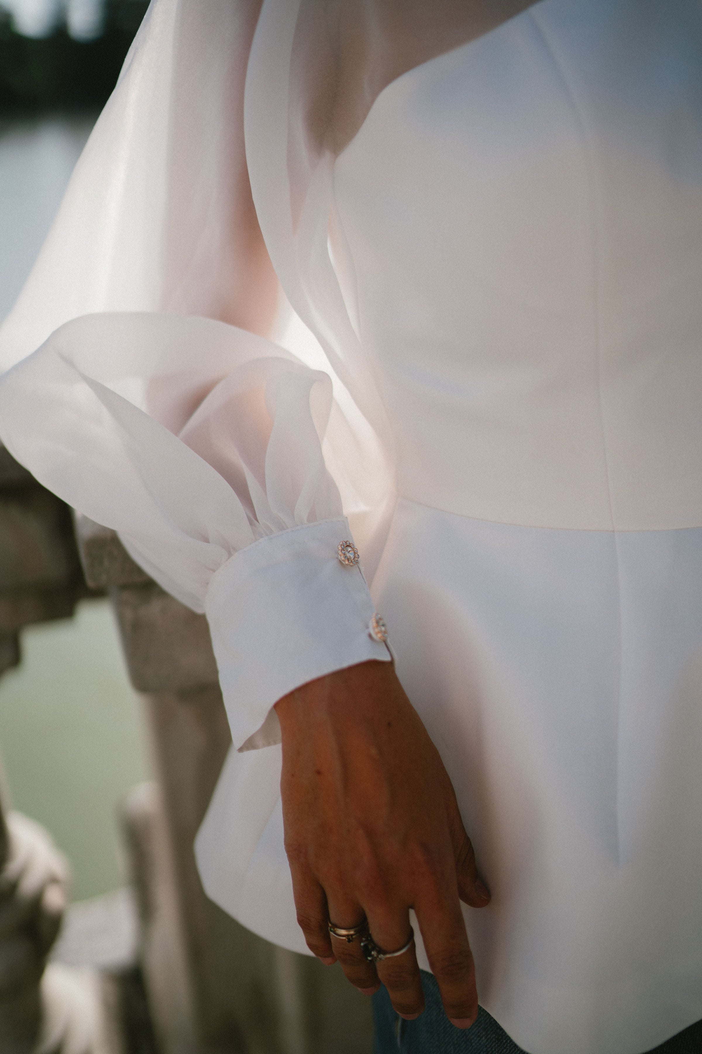WHITE BLOUSE WITH JEWEL BUTTONS